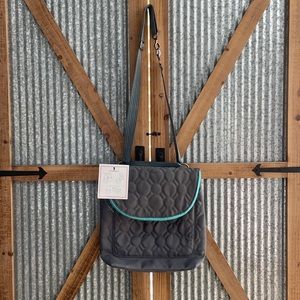 NWT thirty one back back purse .